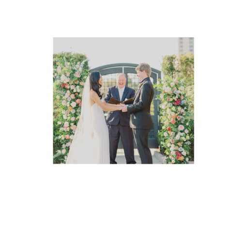 Reverend Howard Wayland with Texas Wedding Ministers laughing with couple during wedding ceremony