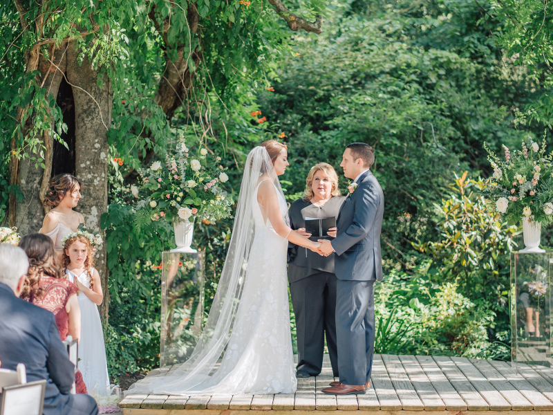 Minister Roxanne Worsham with Texas Wedding Ministers with couple during wedding ceremony