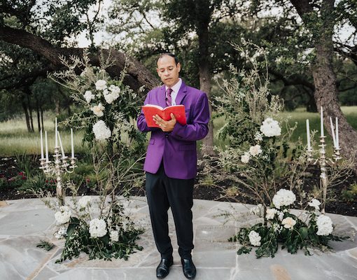 Reverend Rene Texas Wedding Minister officiating at style shoot in purple ivory suit