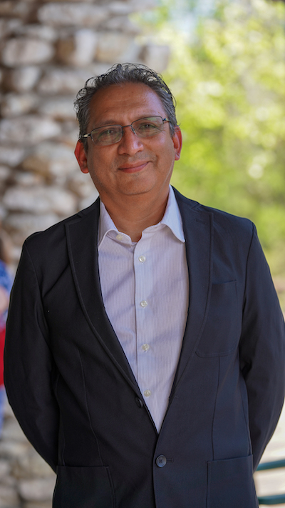 Officiant Hector Casillas posing for photo