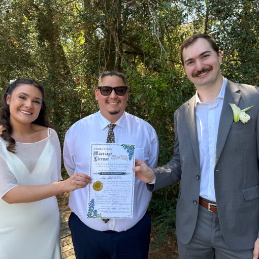 Minister Henry Benavides with Couple he married